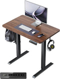 FEZIBO One-Piece Standing Desk Adjustable Height Stand up Home Office Desk, 32x20 Inch Electric Standing Computer Desk, with 4 Memory Presets, Headphone Hook, Black Walnut