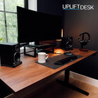 UPLIFTDESK V2 2-Leg Walnut Laminate Wood Standing Desk – Adjustable Height, Advanced 1-Touch Memory Keypad, Under Desk Cable Management, Wire Grommets & Rocker Board (Black C-Frame, 60 x 30 inch)