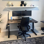 UPLIFTDESK V2 2-Leg Walnut Laminate Wood Standing Desk – Adjustable Height, Advanced 1-Touch Memory Keypad, Under Desk Cable Management, Wire Grommets & Rocker Board (Black C-Frame, 60 x 30 inch)