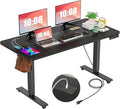 farexon Electric Standing Desk Adjustable Height Desk 55 x 24In with Charging Station, Stand up Desk with Oversized Mouse Pad, 4 Caster, 4 Preset Heights Easy to Set, 27''-45'' Lifting Range(Black