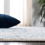 SAFAVIEH Area Rug 9x12 - Evoke Collection - Large - Ivory & Navy, Distressed Design, Non-Shedding & Easy to Clean, Ideal for Living Room, Bedroom, Dining Space (EVK256N)