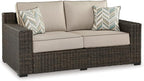 Signature Design by Ashley Coastline Bay Casual Weather Resistant Outdoor Loveseat with Cushion and 2 Throw Pillows, Nuvella Weather Resistant Fabric, Beige & Dark Brown
