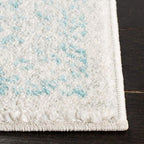 SAFAVIEH Evoke Collection Area Rug - 6'7" Square, Ivory & Aqua, Distressed Design, Non-Shedding & Easy to Clean, Ideal for Living Room, Bedroom, Dining Space (EVK256J)
