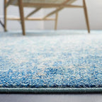 SAFAVIEH Evoke Collection Area Rug - 9' Round, Blue & Ivory, Distressed Design, Non-Shedding & Easy to Clean, Ideal for Living Room, Bedroom, Dining Space (EVK256C)