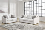 Signature Design by Ashley Maitelynn Contemporary Loveseat with Accent Pillows, Reversible Cushions and Sloped Arms, Light Gray