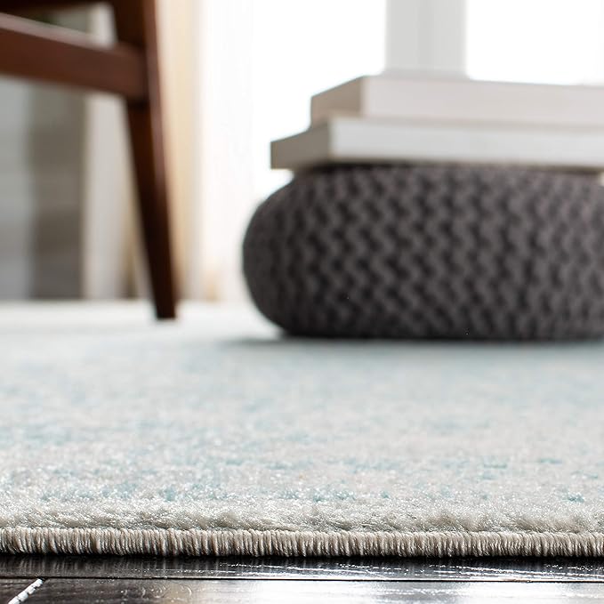 SAFAVIEH Evoke Collection Area Rug - 6'7" Square, Ivory & Aqua, Distressed Design, Non-Shedding & Easy to Clean, Ideal for Living Room, Bedroom, Dining Space (EVK256J)