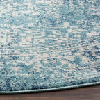 SAFAVIEH Evoke Collection Area Rug - 5'3" Round, Blue & Ivory, Distressed Design, Non-Shedding & Easy to Clean, Ideal for Living Room, Bedroom, Dining Space (EVK256C)