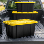 Sterilite 38 Gal Industrial Tote, Stackable Storage Bin with Snap-Fit Lid for Garage, Basement & Attic Storage, Black Base and Yellow Lily Lid, 4-Pack