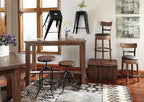 Signature Design by Ashley Pinnadel |24.25" Counter-Height Swivel Bar Stool – Modern Farmhouse, Faux Leather, 360° Swivel, Nailhead Trim, Rustic Light Brown