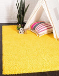 Unique Loom Solid Shag Collection Area Rug (9' x 12' 2" Rectangle Tuscan Sun Yellow)