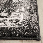 SAFAVIEH Evoke Collection Area Rug - 6'7" Square, Black & Grey, Distressed Design, Non-Shedding & Easy to Clean, Ideal for Living Room, Bedroom, Dining Space (EVK256R)