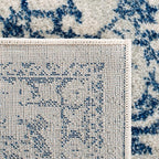 SAFAVIEH Area Rug 9x12 - Evoke Collection - Large - Ivory & Navy, Distressed Design, Non-Shedding & Easy to Clean, Ideal for Living Room, Bedroom, Dining Space (EVK256N)