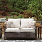 Signature Design by Ashley Paradise Trail Outdoor Loveseat with All Weather Cushions, Nuvella Weather Resistant Fabric, Medium Brown