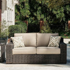 Signature Design by Ashley Coastline Bay Casual Weather Resistant Outdoor Loveseat with Cushion and 2 Throw Pillows, Nuvella Weather Resistant Fabric, Beige & Dark Brown
