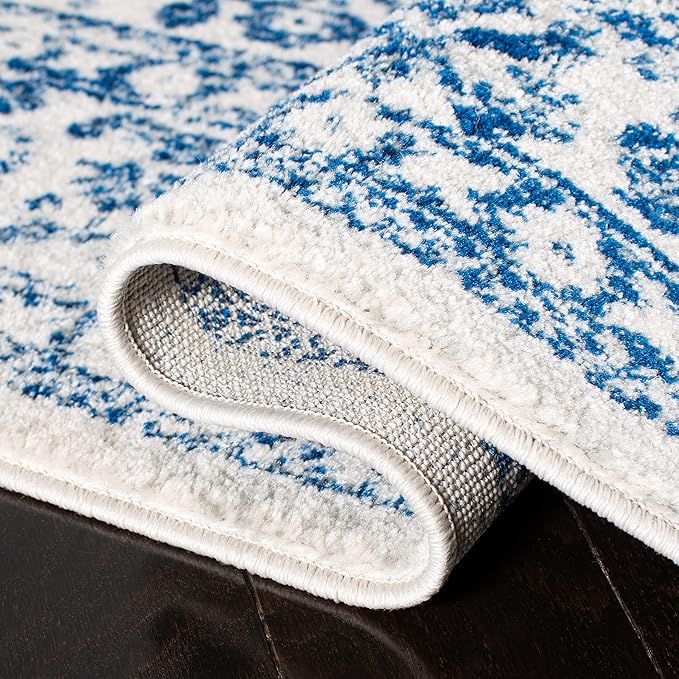 SAFAVIEH Area Rug 9x12 - Evoke Collection - Large - Ivory & Navy, Distressed Design, Non-Shedding & Easy to Clean, Ideal for Living Room, Bedroom, Dining Space (EVK256N)