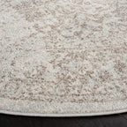 SAFAVIEH Evoke Collection Area Rug - 8' Round, Ivory & Taupe, Distressed Design, Non-Shedding & Easy to Clean, Ideal for Living Room, Bedroom, Dining Space (EVK256E)