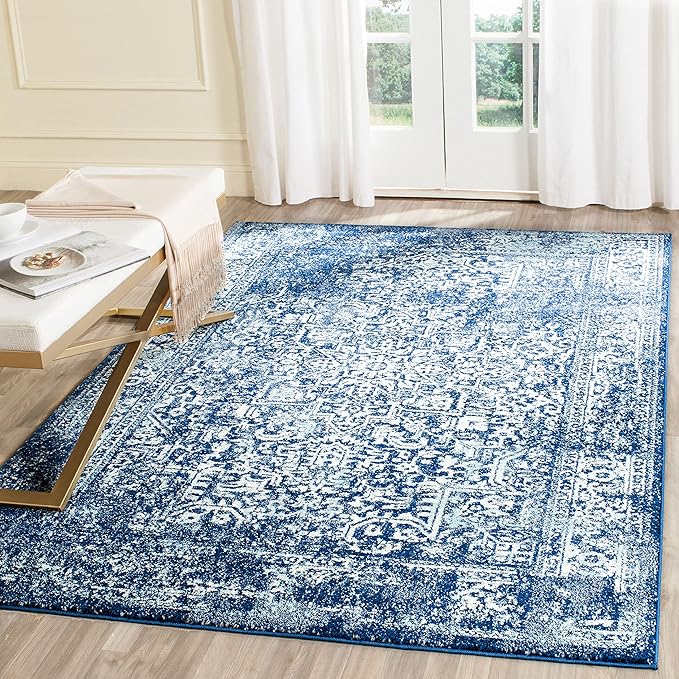 SAFAVIEH Evoke Collection Area Rug - 6'7" x 9', Navy & Ivory, Distressed Design, Non-Shedding & Easy to Clean, Ideal for Living Room, Bedroom, Dining Space (EVK256A)