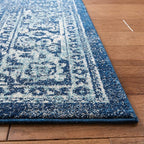 SAFAVIEH Evoke Collection Area Rug - 6'7" x 9', Navy & Ivory, Distressed Design, Non-Shedding & Easy to Clean, Ideal for Living Room, Bedroom, Dining Space (EVK256A)